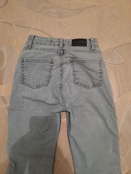 Джинси кльош від коліна світло-сині ,розмір 34 (XS]