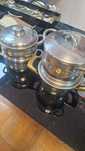 Tachos em inox de cozinha