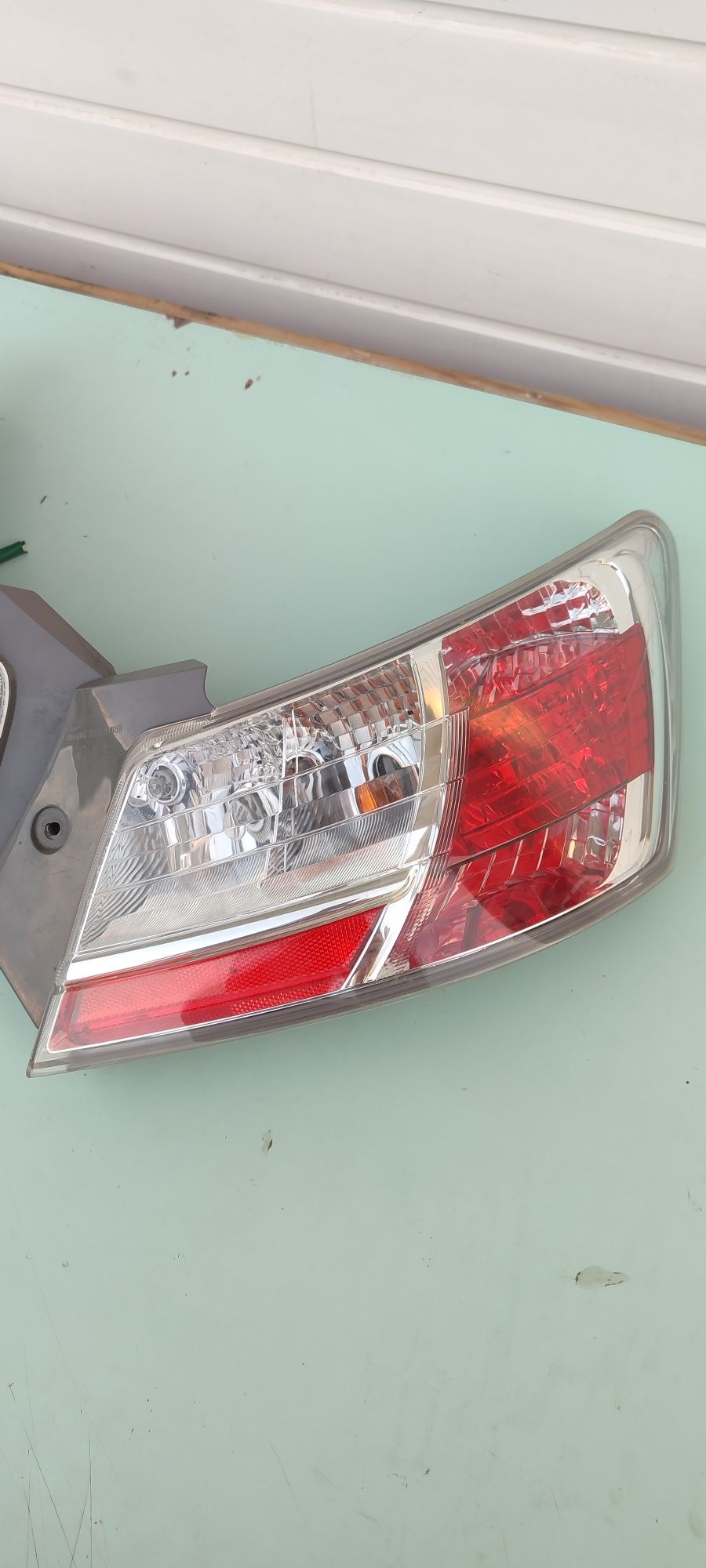 Фонарь Daihatsu Materia