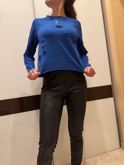 Лосини з еко-шкіри спереду та тканини ззаду, розмір s.