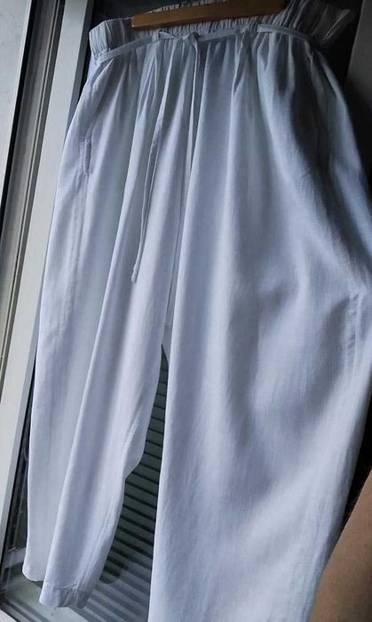 Белые льняные  брюки  фасон бананы  на бедра 120 см  лен льон лляні