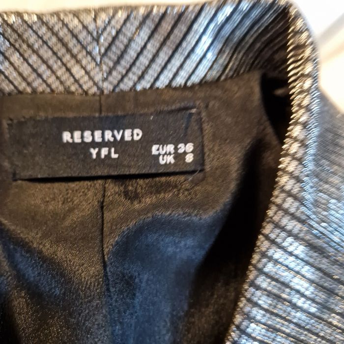 Srebrzysta błyszcząca marynarka Reserved 36 Sylwester