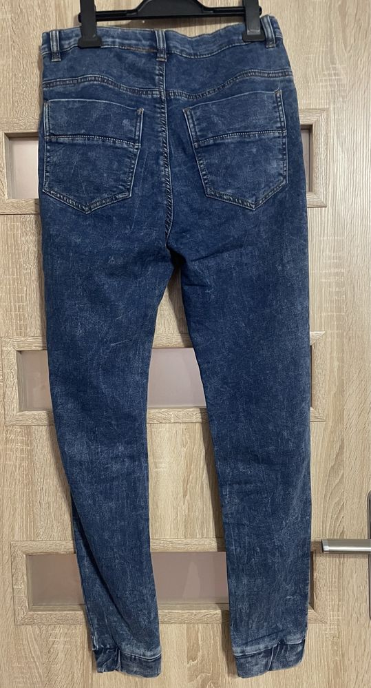 Spodnie jeans 170
