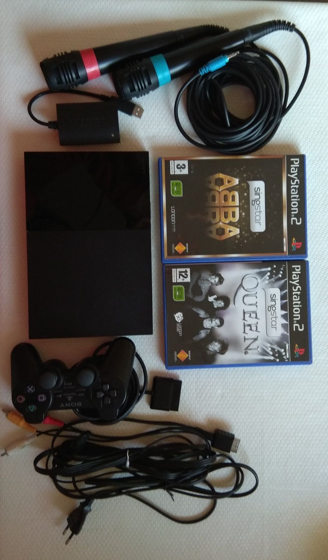 Play station 2 - 50€ | microfones singstar - 20€
