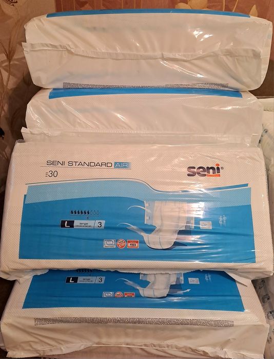 Продам памперсы для взрослых цены розные новые в упаковке.