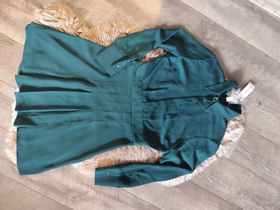 Elegancka sukienka z plisowanym dolem r.34