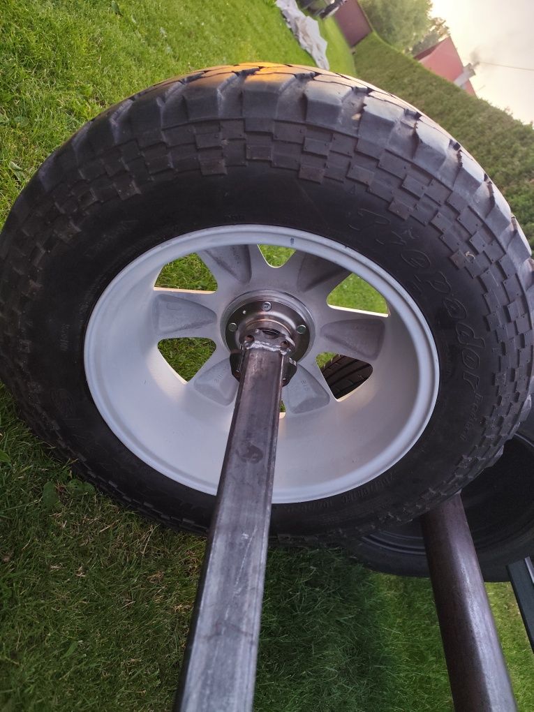 Nowa oś z piastami 4x110  pod wózek