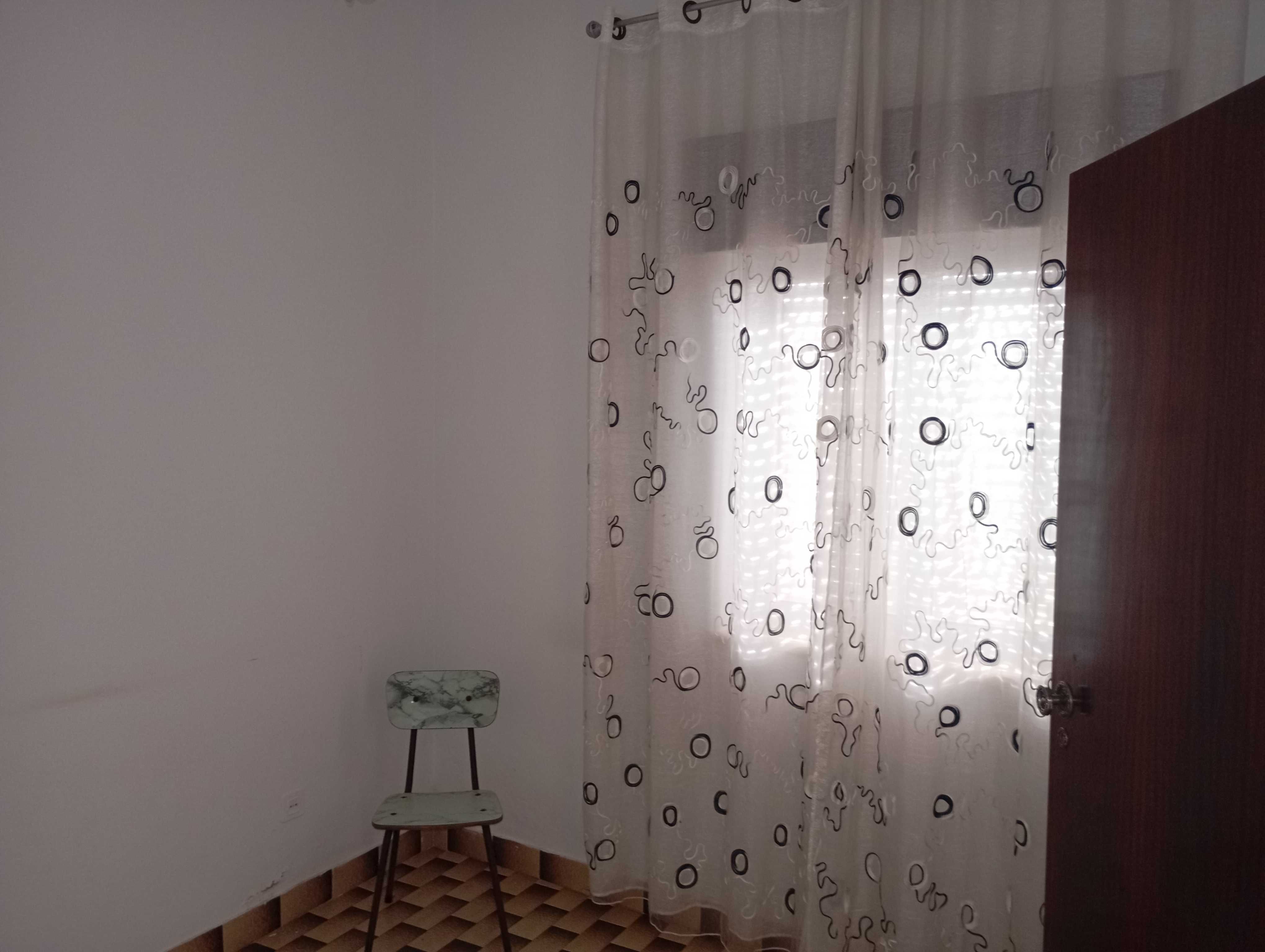 Casa com terraço e quintal