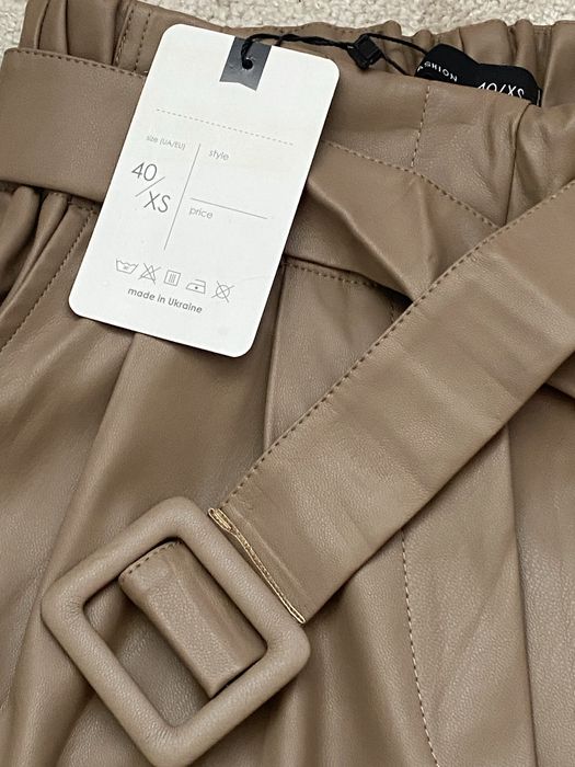 Нові брюки з еко шкіри