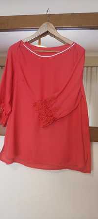 Blusa de senhora, em Coral. Veste um L