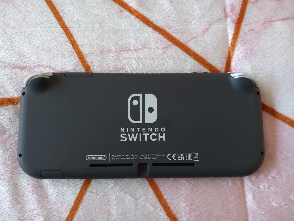 Vendo Nintendo switch lite cinzenta