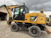 Caterpillar M313D  Caterpillar M313D, Świeżo sprowadzona z Niemiec, super stan