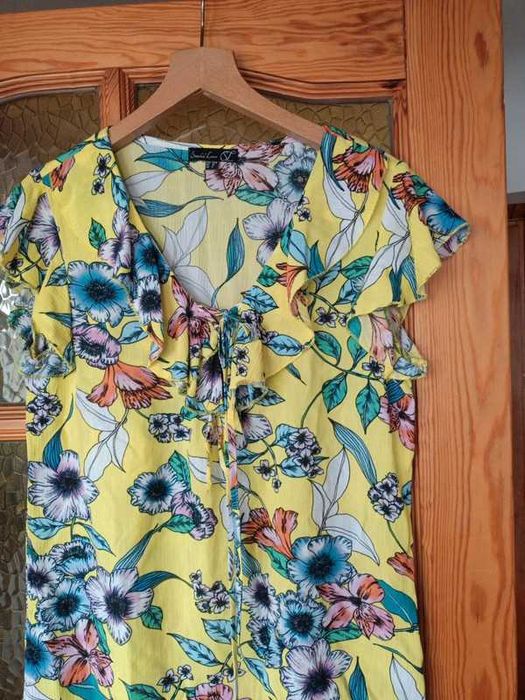 Żółta bluzka w kwiaty damska z falbanką