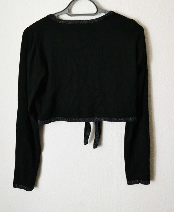 Czarne bolerko ze srebrną lamówką