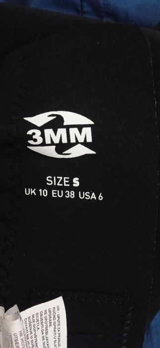 продам гидрокостюм Trespass, Olaian