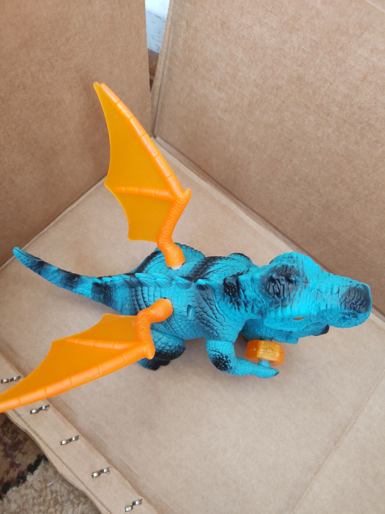 Дитяча іграшка динозавр на батарейках музичний