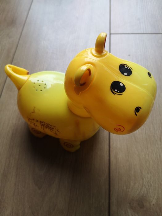 Jeżdżący hipopotam zabawka grająca do raczkowania