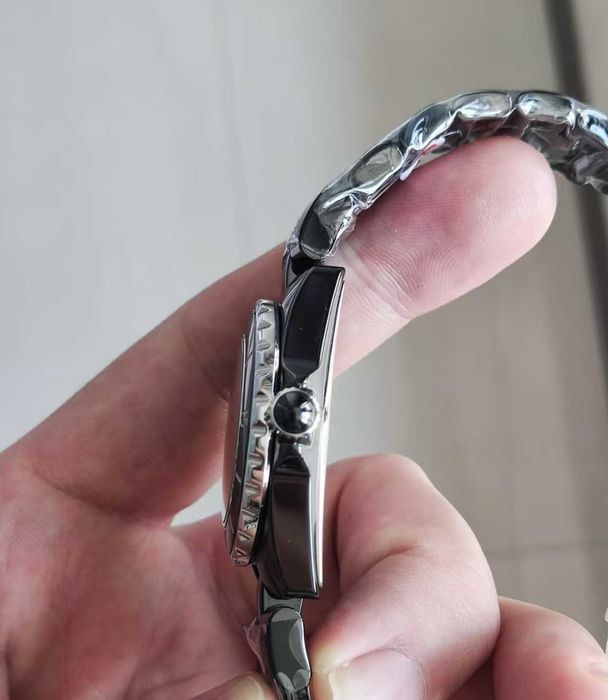 Czarny zegarek męski marki Chanel