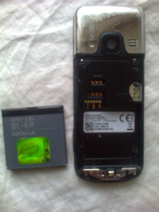 6700-c1 srebna.Nokia E66.