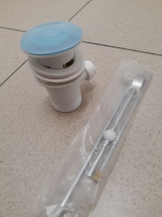 Korek do umywalki z przelewem