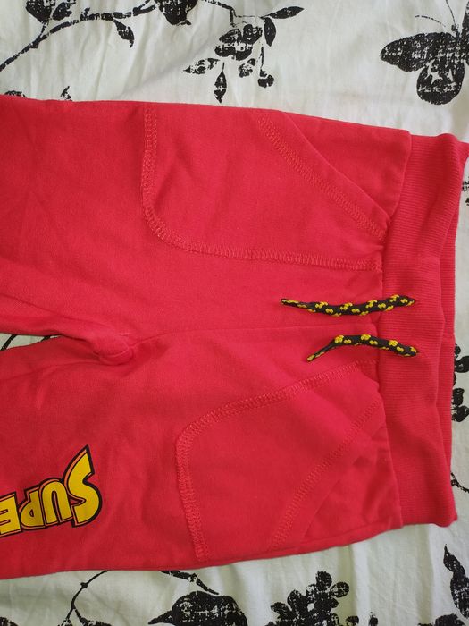 Nowe spodnie dresowe czerwone 92 cm supermen