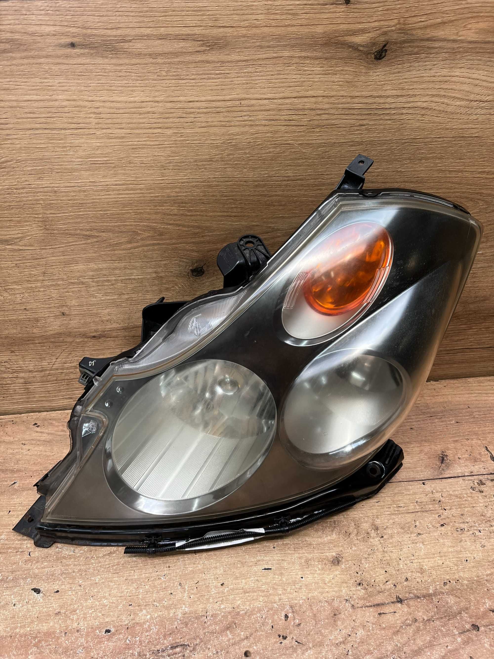 Lampa/reflektor przedni lewy Honda Steram Lift