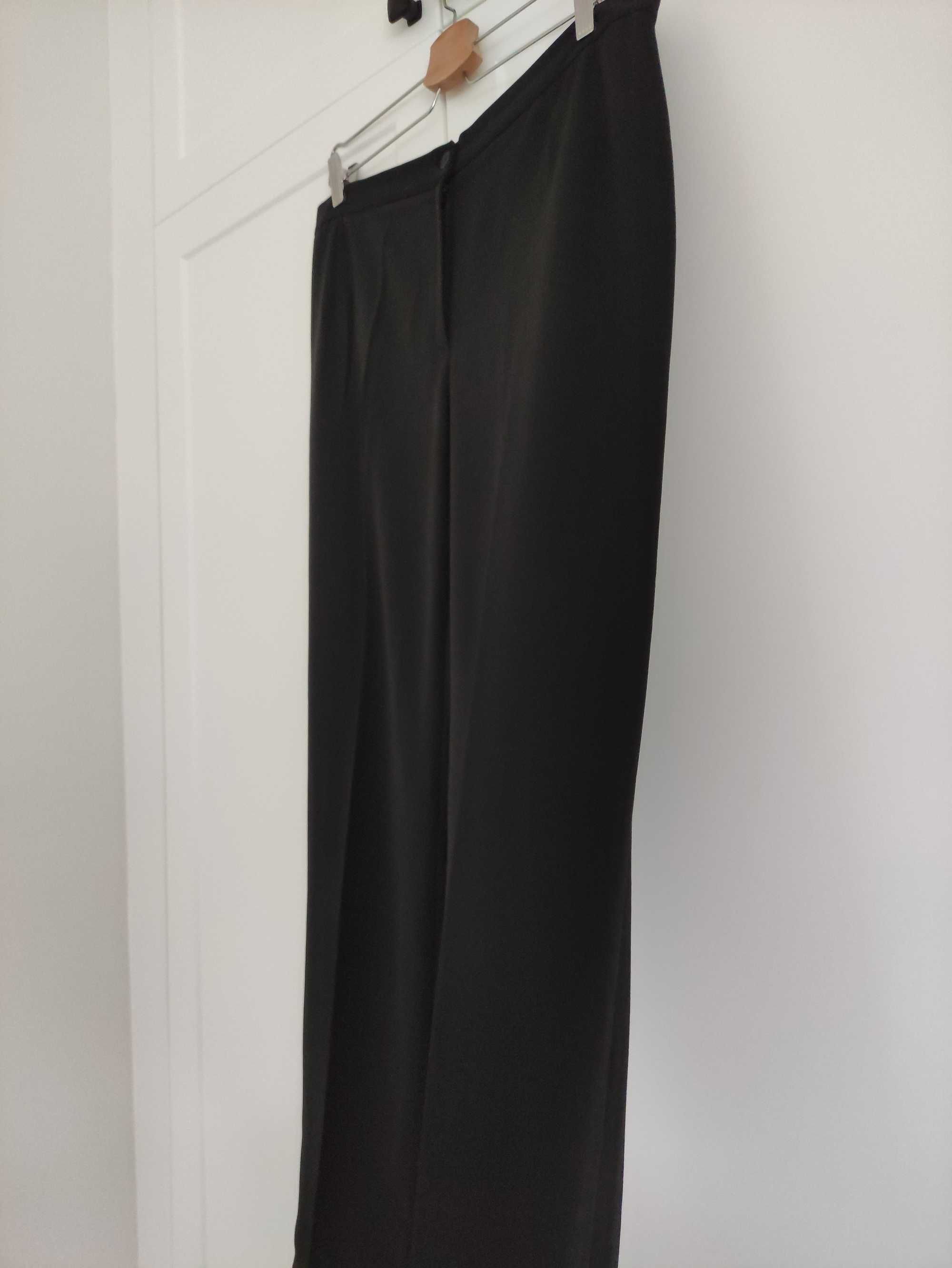 Czarne eleganckie spodnie szeroka nogawka
