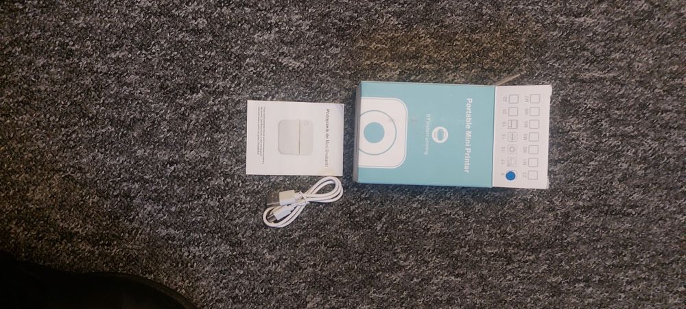 Mini drukarka do zdjęć z papierem w srod