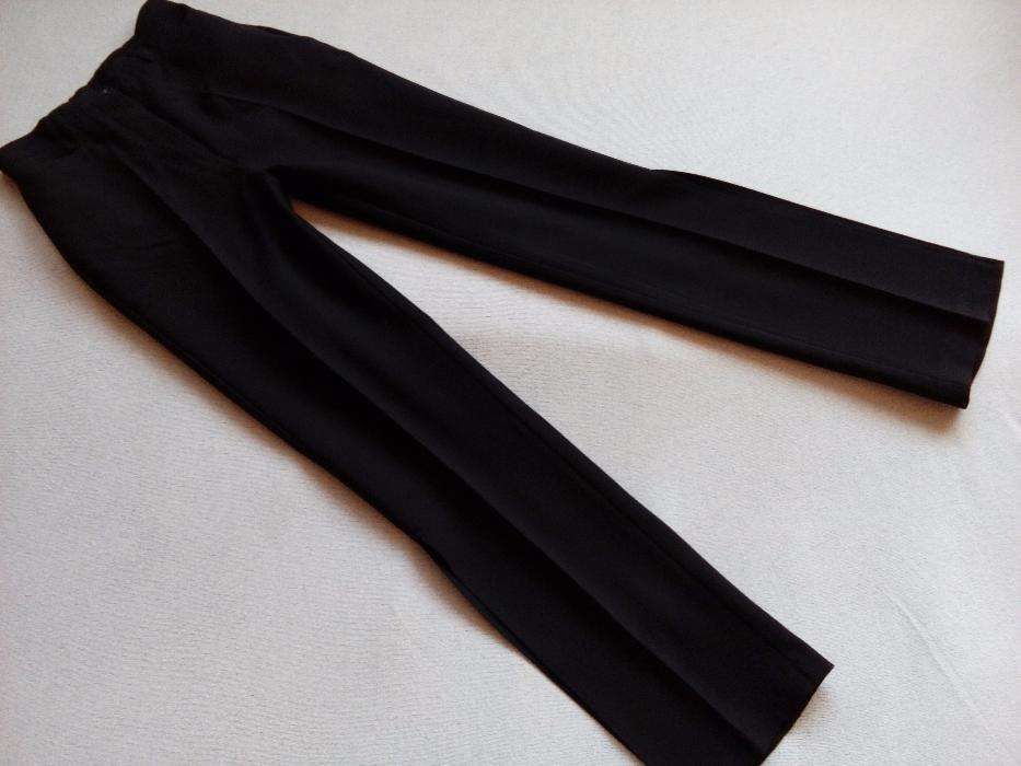 Eleganckie czarne spodnie z rozcięciami