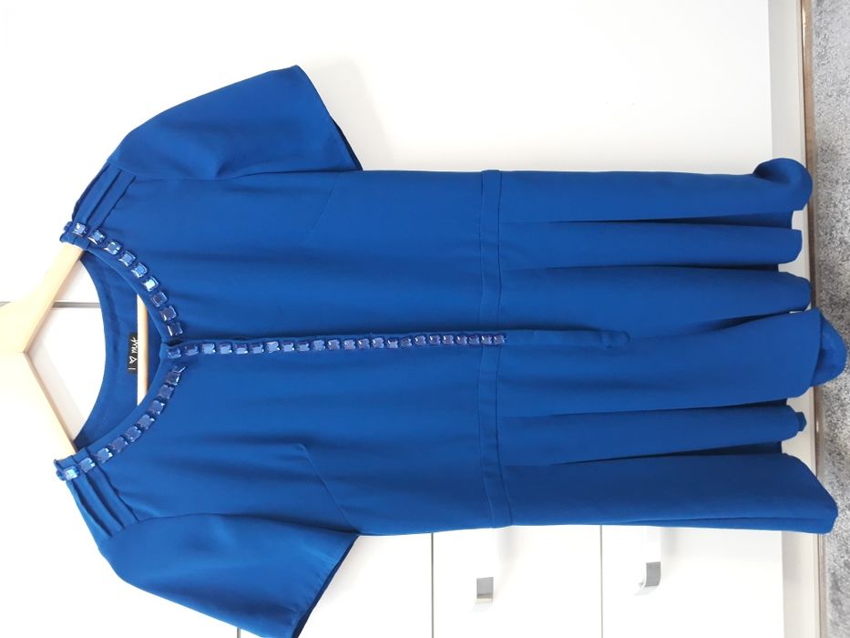 Kombinezon next elegancki