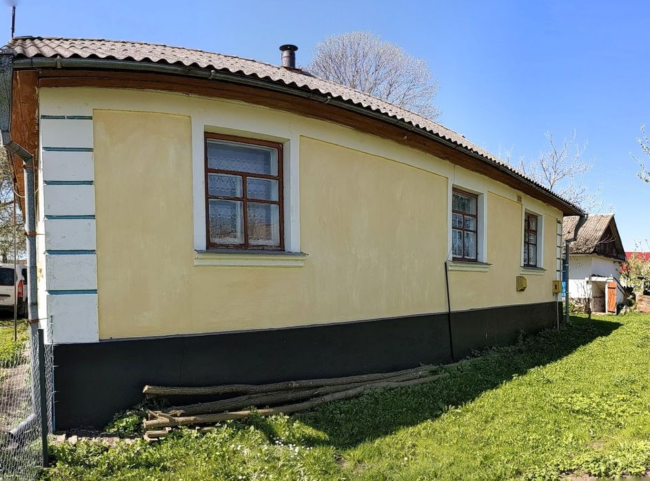 Будинок, присадибна ділянка та город