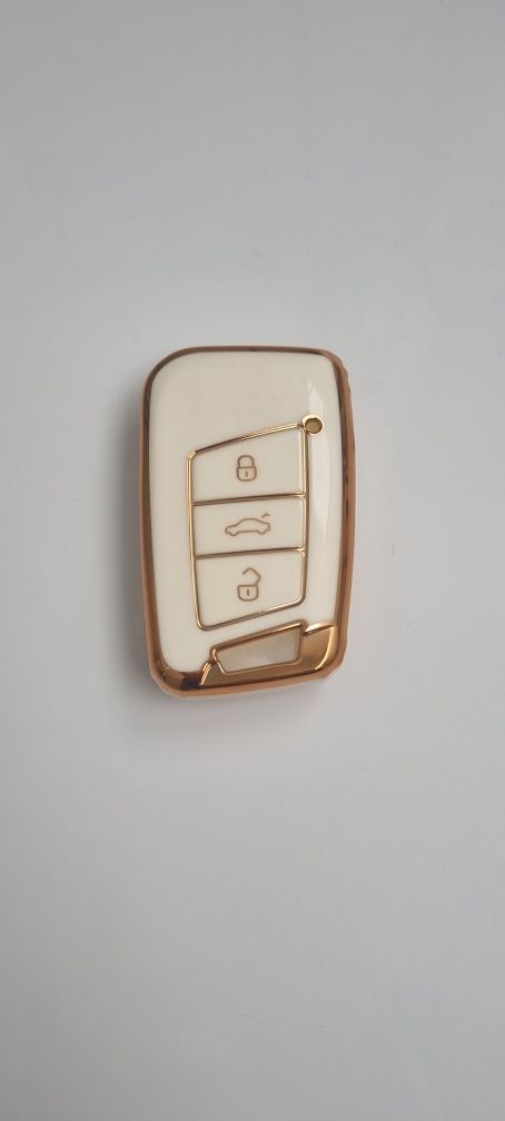 Capa chave VW  branco e  dourado