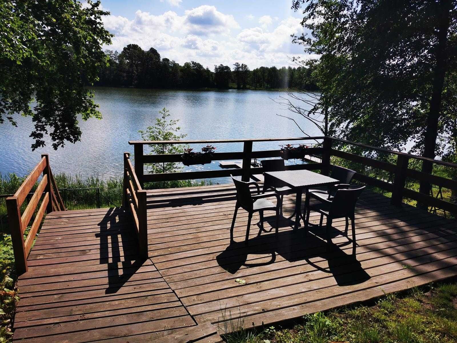 Domek na Mazurach Domki nad jeziorem Pozorty enklawaUrocza Przystań