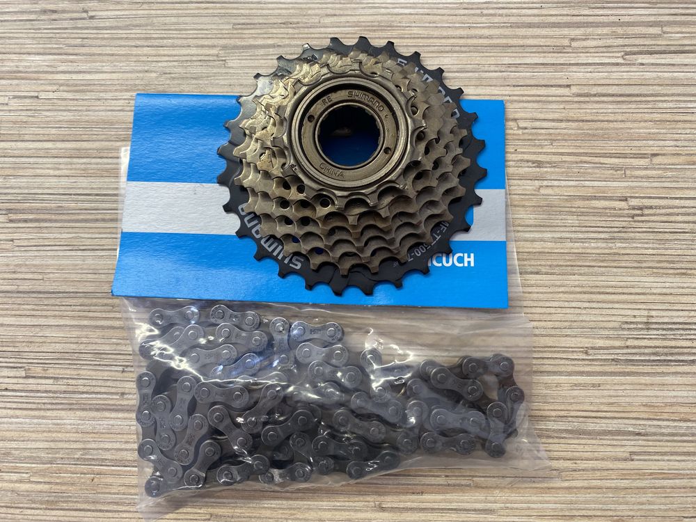 Zestaw wolnobieg Shimano MF-TZ500-7 i łańcuch Shimano CN-HG40