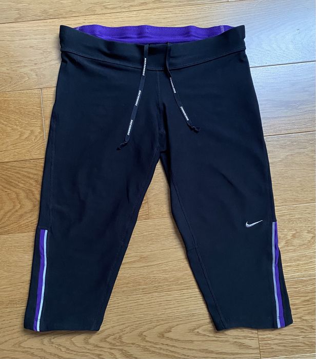 Damskie legginsy getry spodenki 3/4 sportowe do biegania Nike roz. S