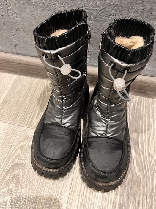 Продам зимові чоботи