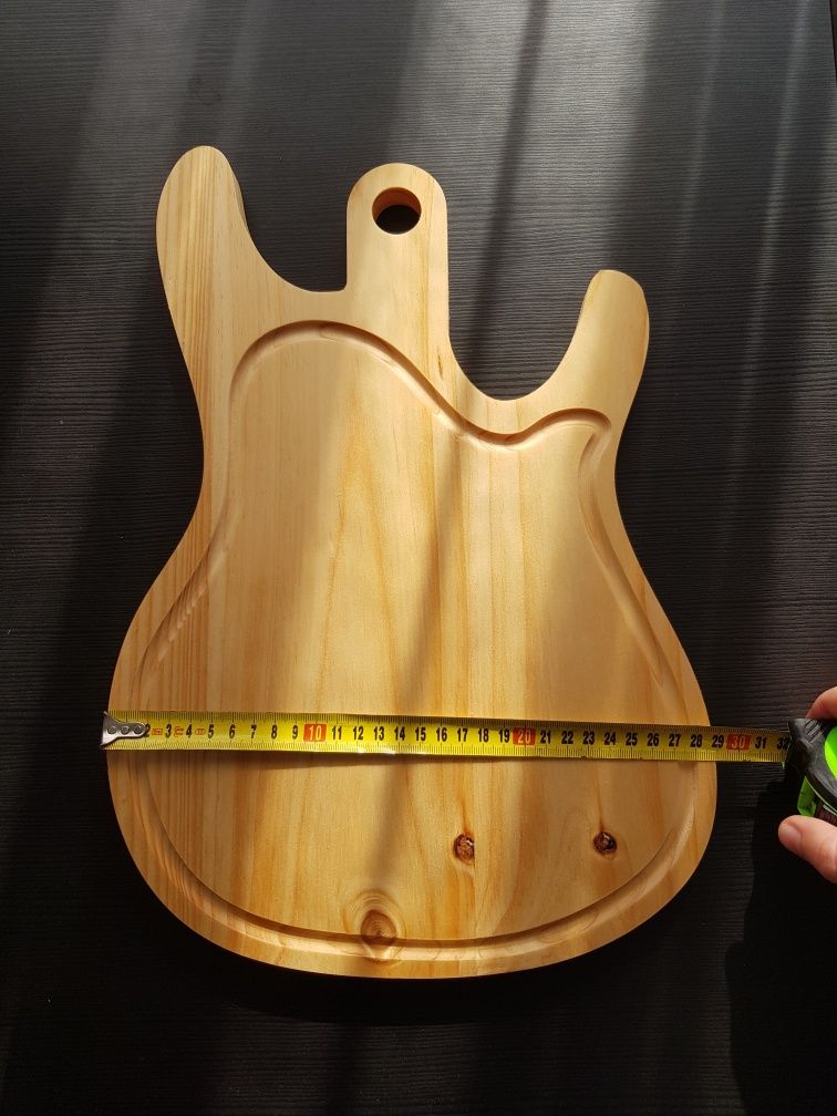 Tábua de corte em forma de guitarra