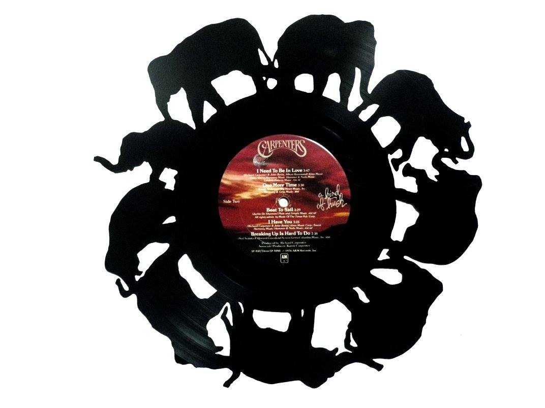 Silhueta decorativa elefantes feita com um disco de vinil LP