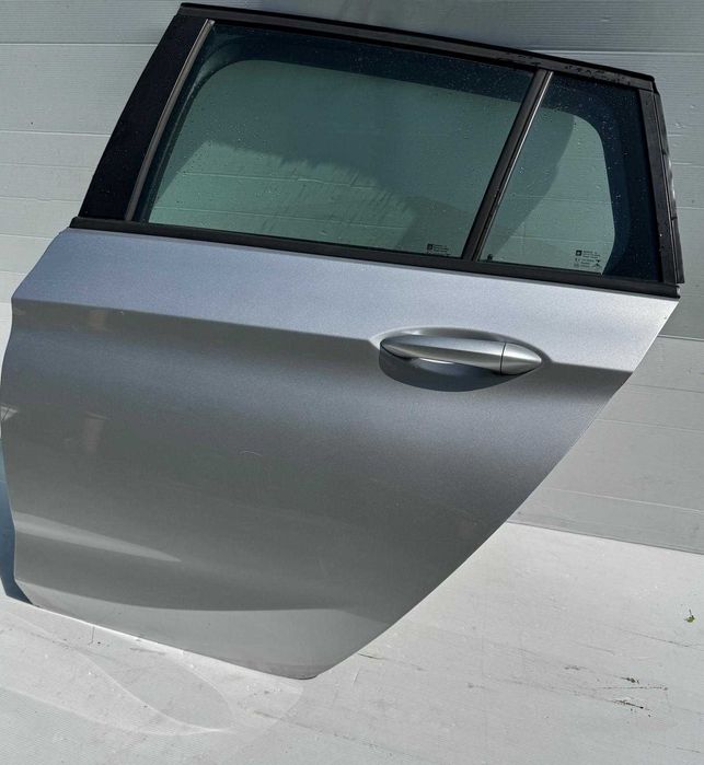 Opel Astra K drzwi lewe tył kombi z176 w kolor