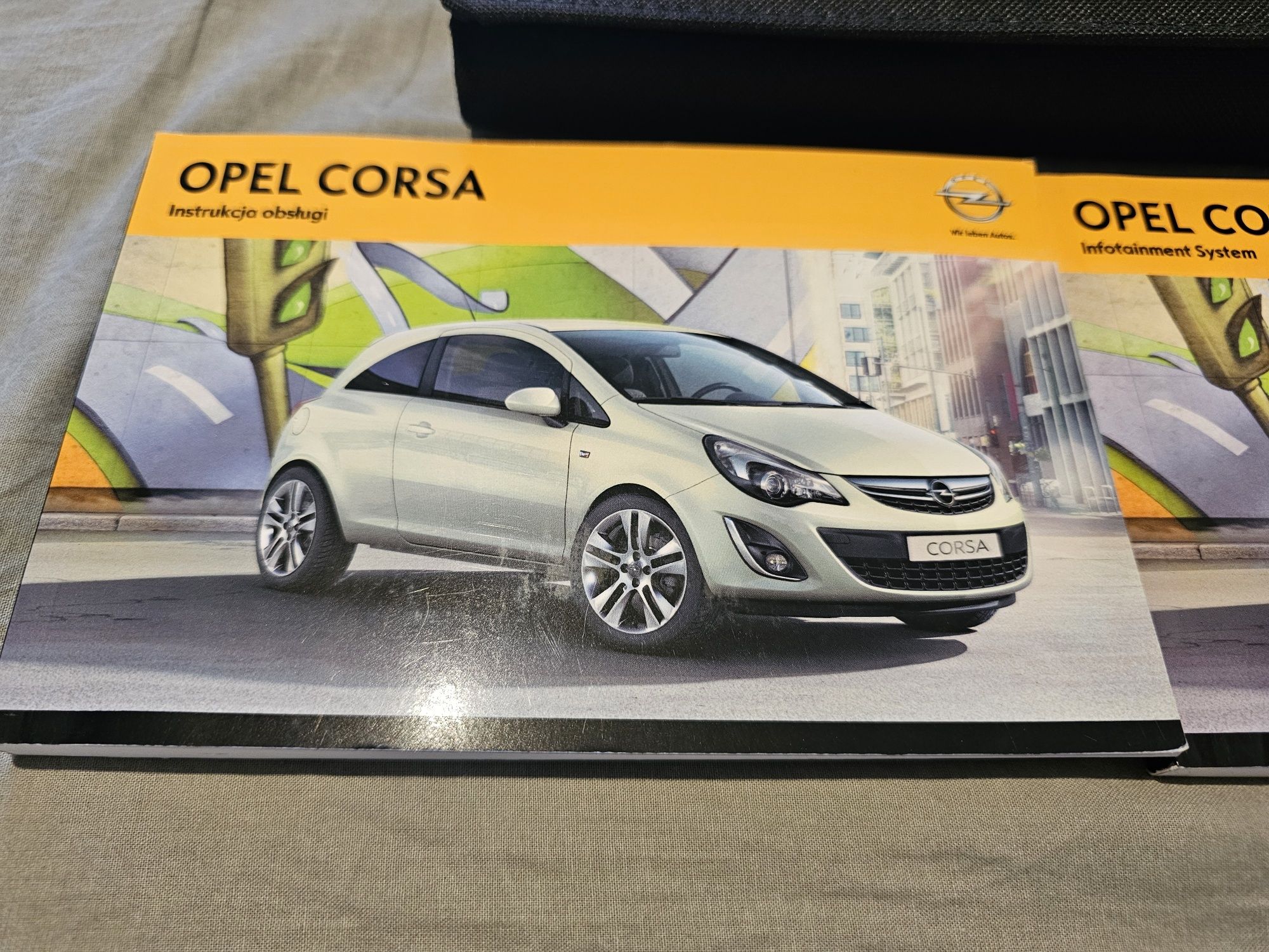 Etui teczka instrukcja obsługi i radia Opel Corsa D lift język polski