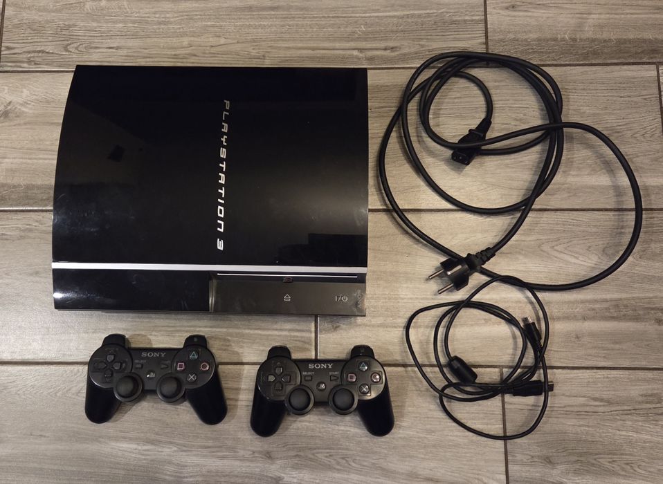 Konsola PS3 plus gry.