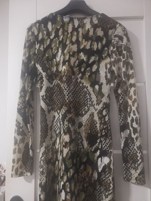 Sukienka elegancka panterka, idealna do pracy jak i na przyjęcie