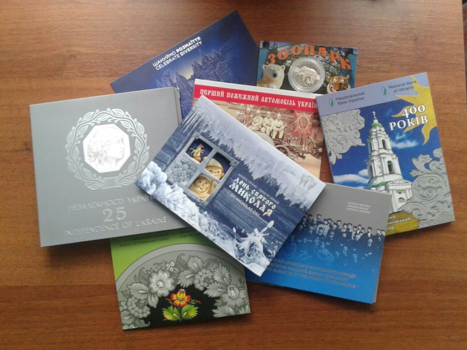 Буклеты к монетам Украины Народжений в Україні Рись Державні символи.