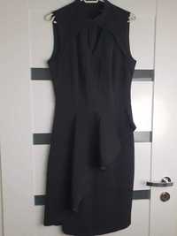 Sukienka Reserved elegancka 38 czarna za kolano, z wycięciem, stan BDB