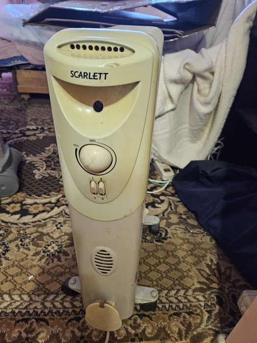 Масляный обогреватель