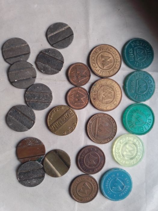 Таксафона  жетон метрополитена.