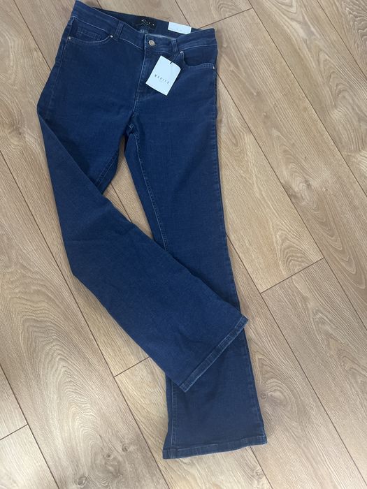 Nowe spodnie jeans Mohito rozm. 38