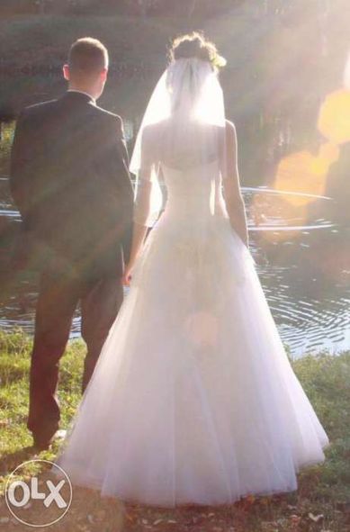 Suknia ślubna Piękna Koronkowa princeska z kokardką