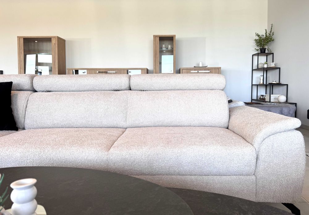 Siella narożnik w tkaninie boucle z funkcją spania - MEBLE PYKA