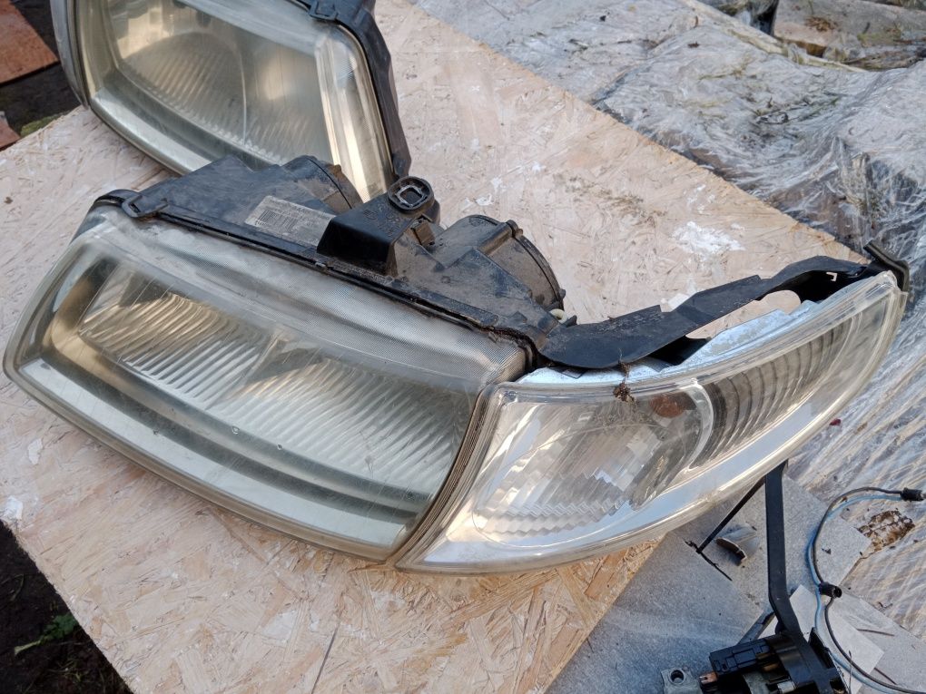 Lampy przednie Saab 95